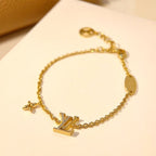 Dream LOGO STAR MOTIF GOLD BRACELET