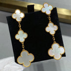 TRAUM-KLEEBLATT-OHRRINGE MIT 3 MOTIVEN IN GOLD