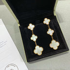 TRAUM-KLEEBLATT-OHRRINGE MIT 3 MOTIVEN IN GOLD