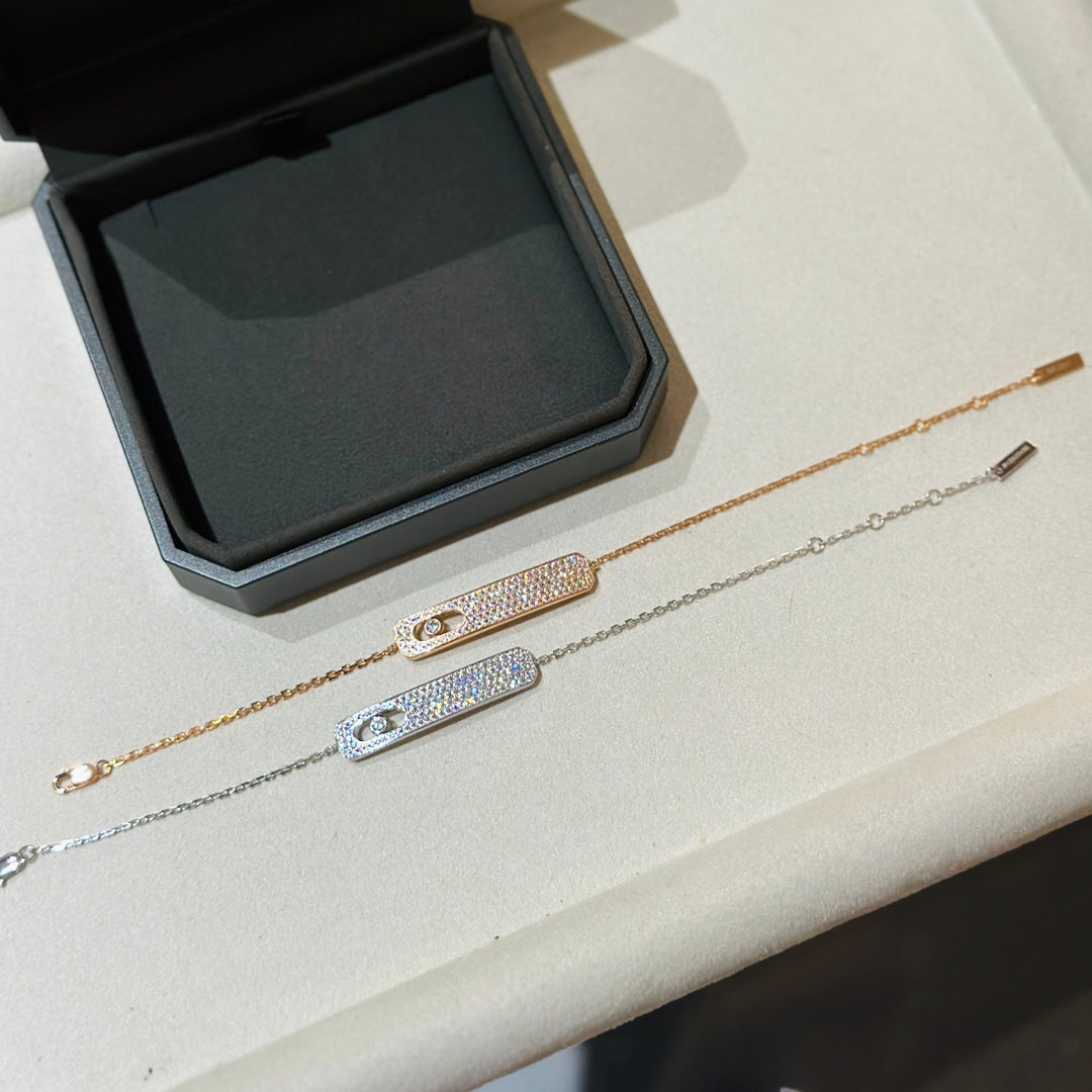 {
  "Dream": "MOVE CLASSIQUE DIAMANT-ARMBAND MIT PAVÉ-FASSUNG"
}