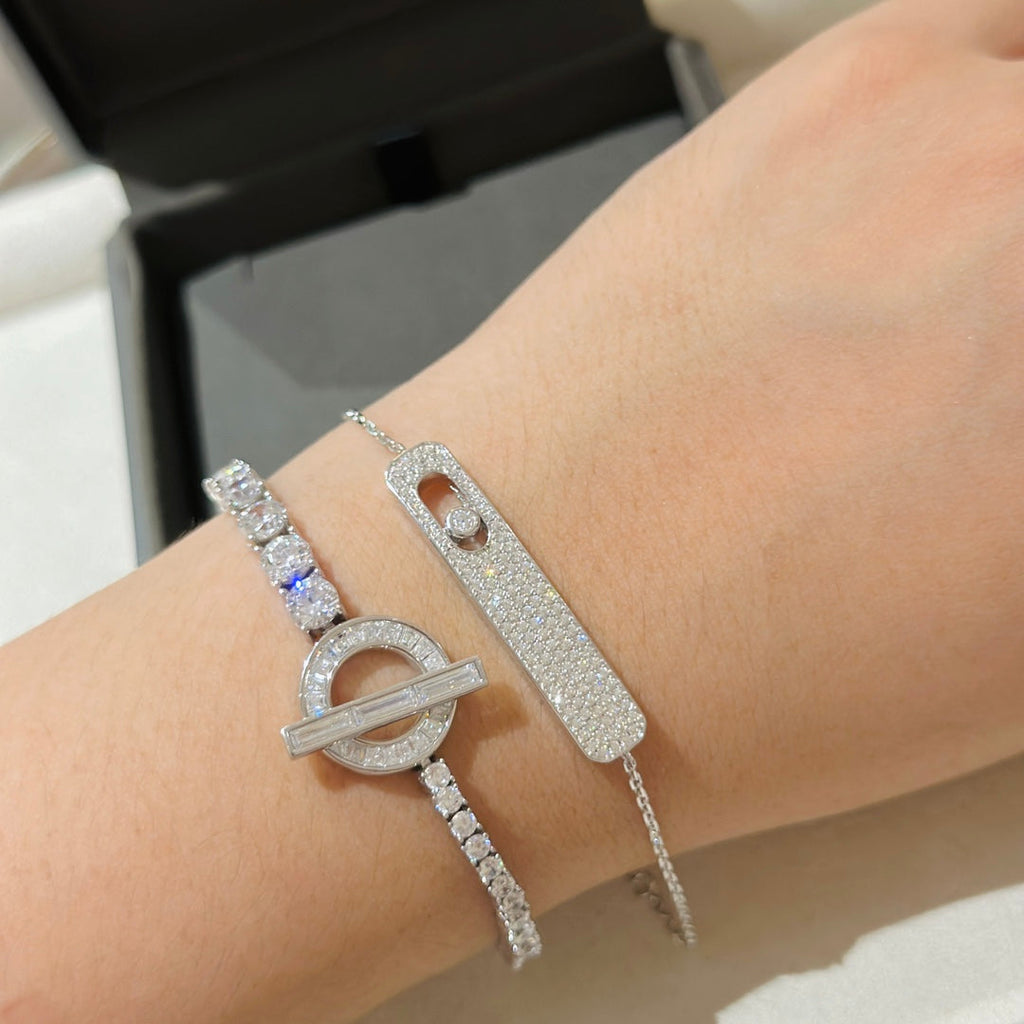 {
  "Dream": "MOVE CLASSIQUE DIAMANT-ARMBAND MIT PAVÉ-FASSUNG"
}