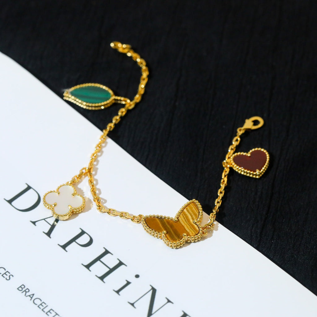 Traumhaftes LUCKY SPRING Armband mit 5 Motiven in Gold
