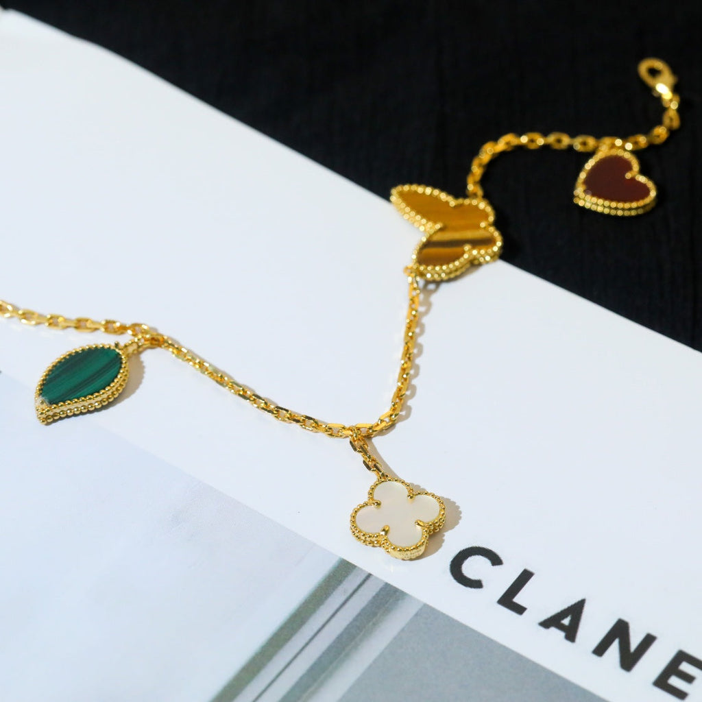 Traumhaftes LUCKY SPRING Armband mit 5 Motiven in Gold