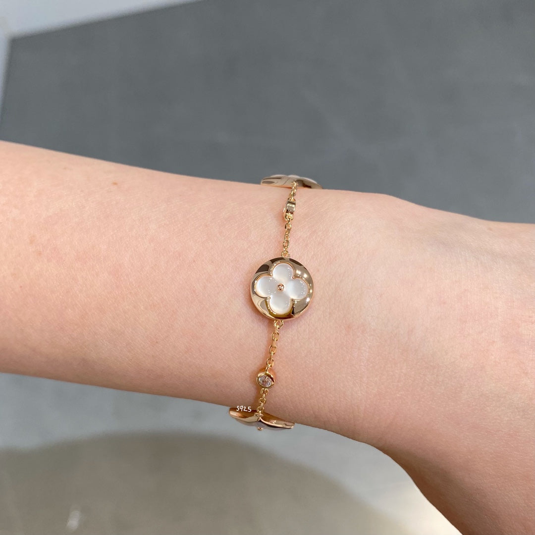 Dream STAR AND SUN 4 MOTIF WHITE MOP PINK GOLD BRACELET