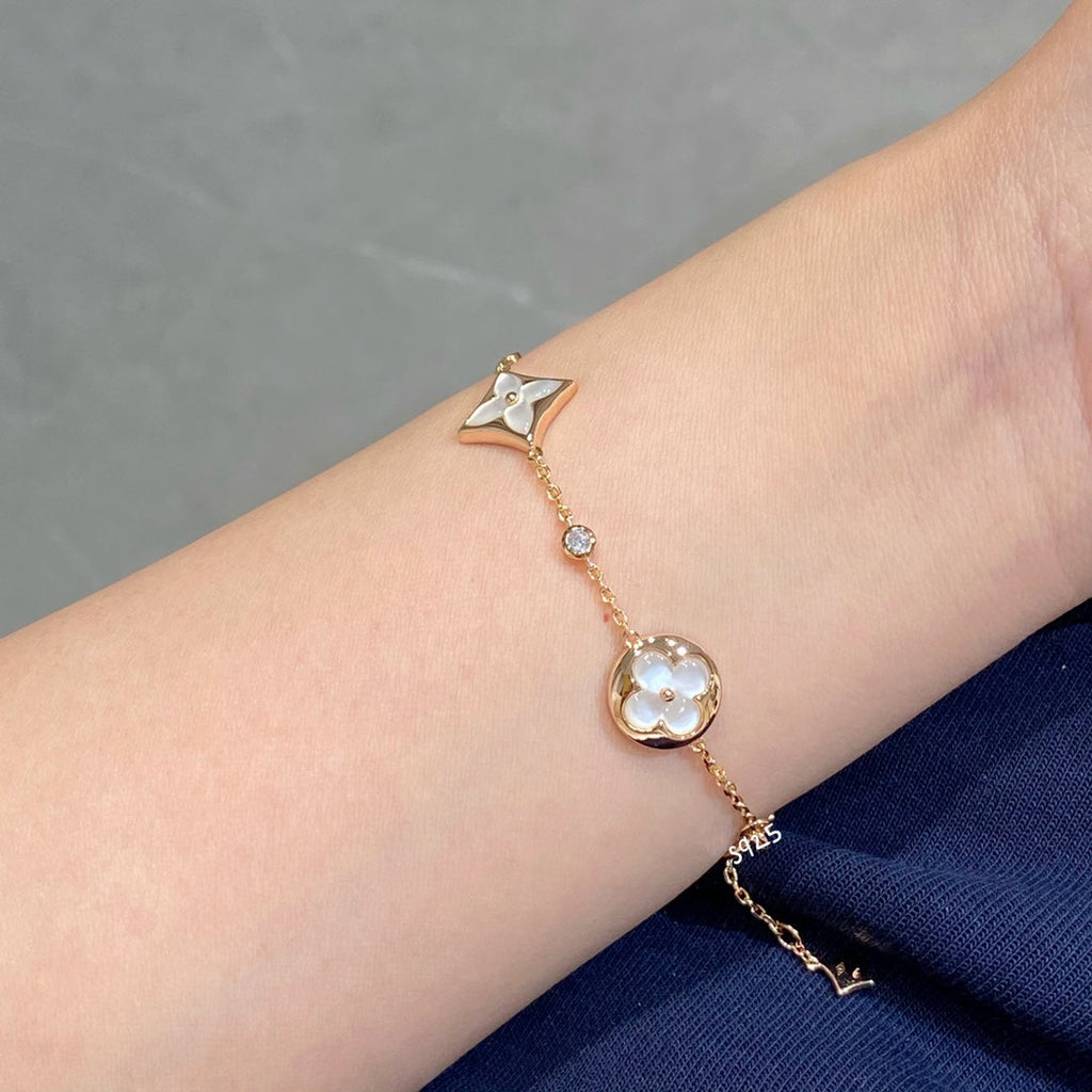 Dream STAR AND SUN 4 MOTIF WHITE MOP PINK GOLD BRACELET