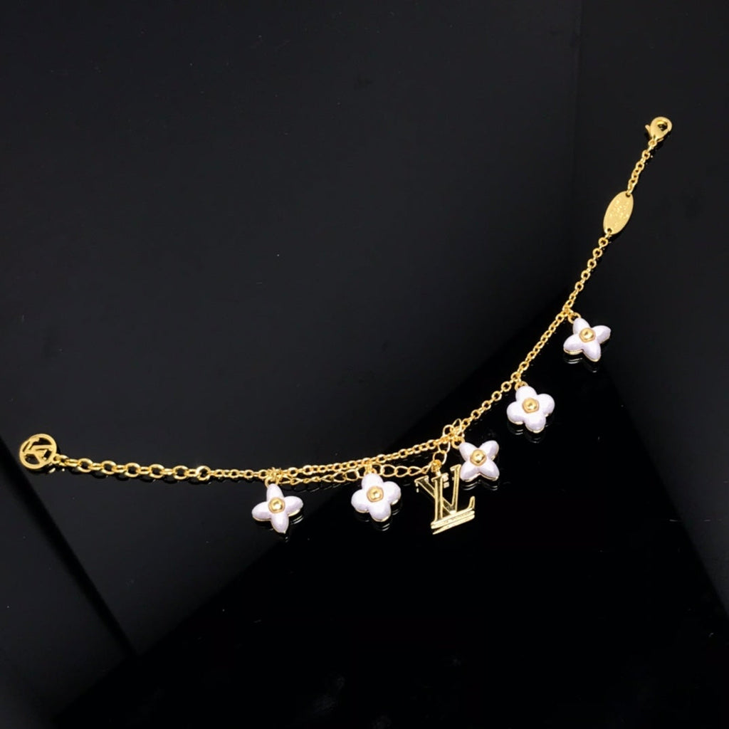 Dream LOGO 6 MOTIF STAR AND SUN GOLD BRACELET
