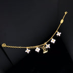 Dream LOGO 6 MOTIF STAR AND SUN GOLD BRACELET