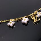 Dream LOGO 6 MOTIF STAR AND SUN GOLD BRACELET