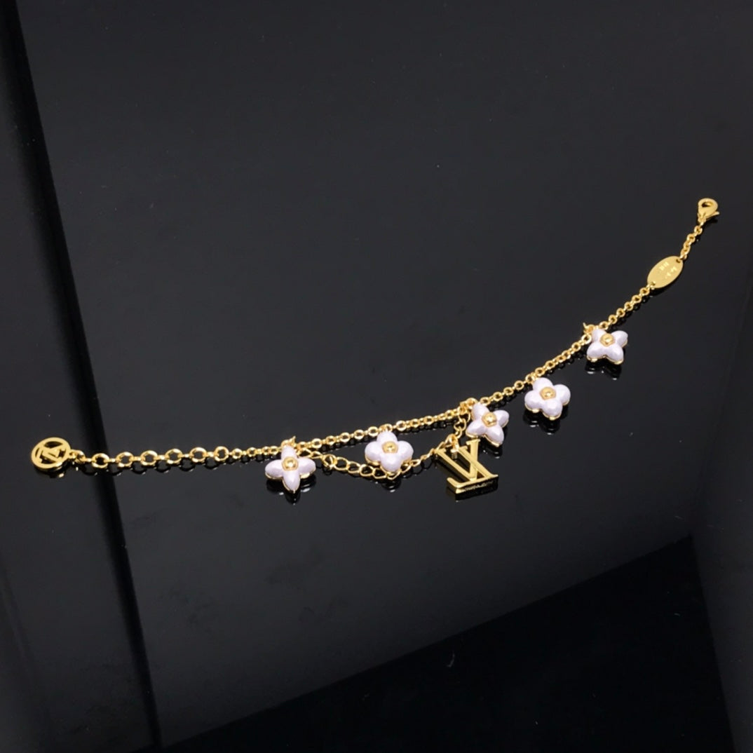 Dream LOGO 6 MOTIF STAR AND SUN GOLD BRACELET