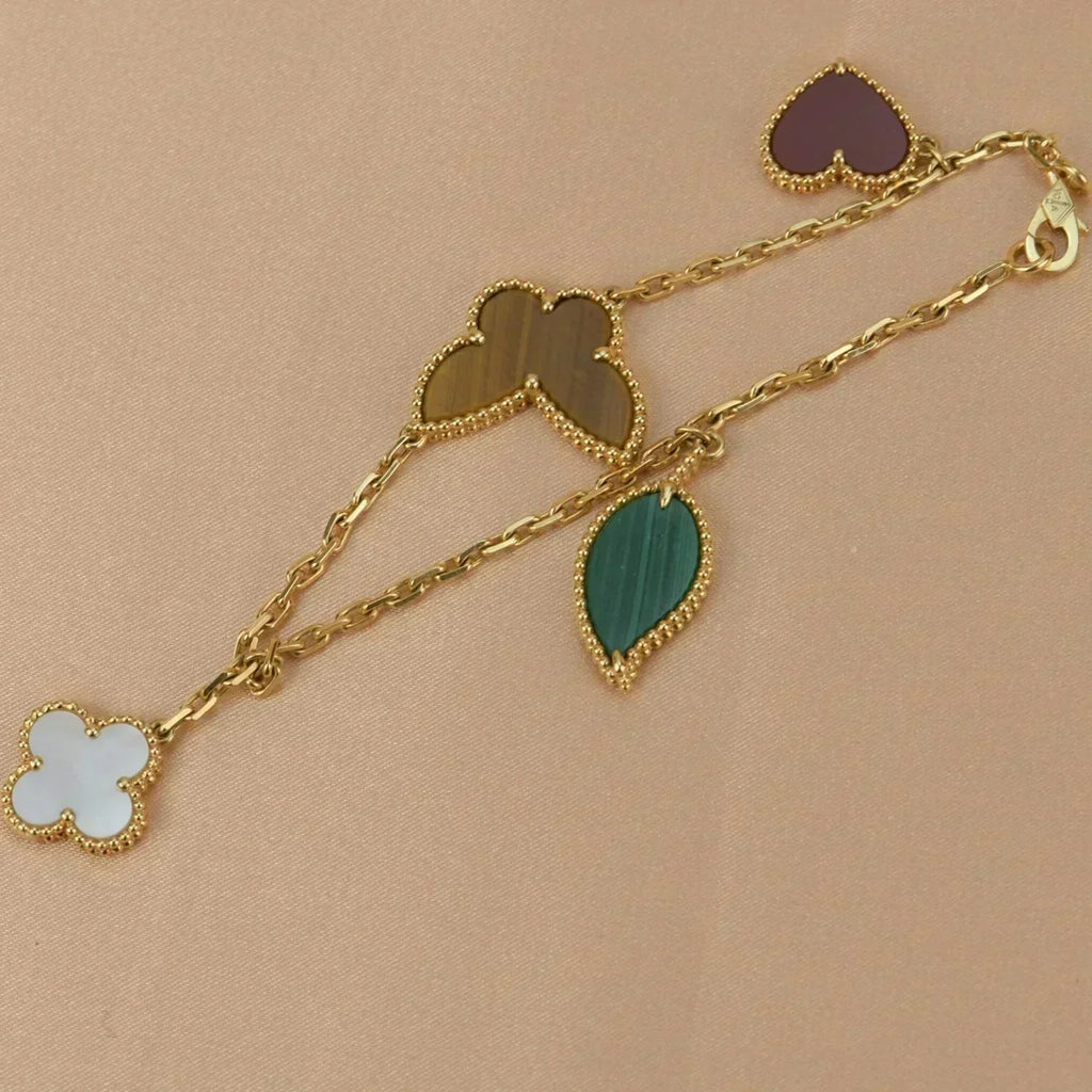 Traumhaftes LUCKY SPRING Armband mit 5 Motiven in Gold