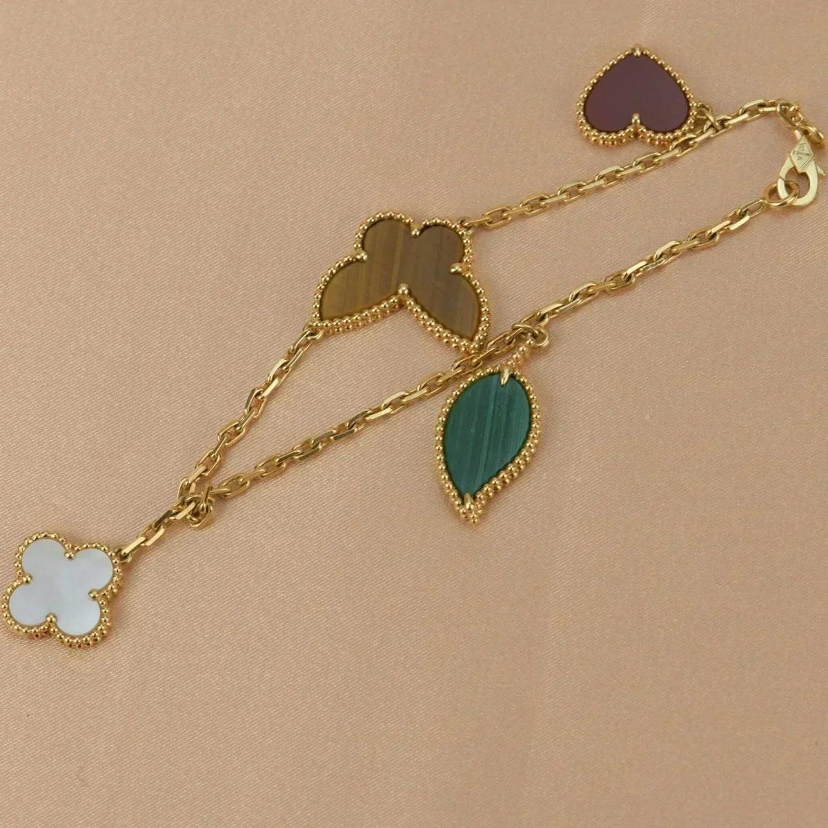 Traumhaftes LUCKY SPRING Armband mit 5 Motiven in Gold