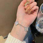 {
  "Dream ": "NEUE CLOVER 5-MOTIV ARMBAND-KOLLEKTION AUS LILA CHALCEDON"
}