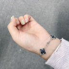 Dream CLOVER 5 MOTIF VEINED ONYX BRACELET SILVER