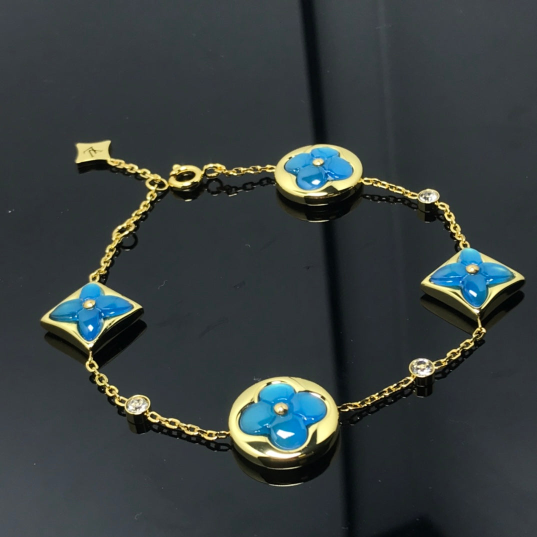 Dream STAR AND SUN 4 MOTIF BLUE BRACELET